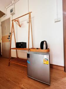 TV a/nebo společenská místnost v ubytování 悠然古城民宿