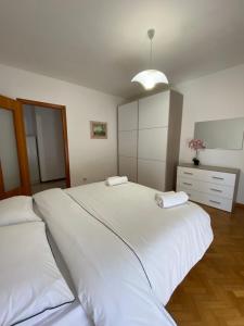 Postel nebo postele na pokoji v ubytování Casa Ahmati Borgo Vesio