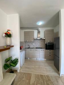 Kuchyň nebo kuchyňský kout v ubytování Casa Ahmati Borgo Vesio