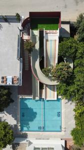 an overhead view of a building with a swimming pool at Gazipasa Star Otel in Side