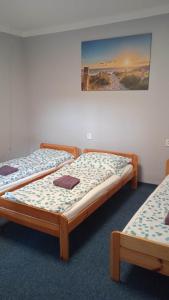 Postel nebo postele na pokoji v ubytování Ubytováni v soukromí Na Podluží
