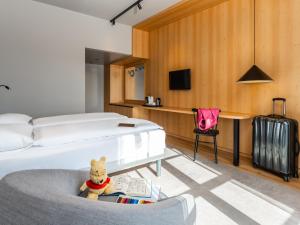 Letto o letti in una camera di ibis Styles Graz Messe