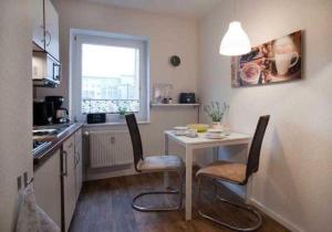 Η κουζίνα ή μικρή κουζίνα στο Ferienwohnung CityFlair _ 32290