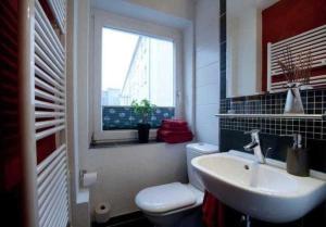 Ένα μπάνιο στο Ferienwohnung CityFlair _ 32290
