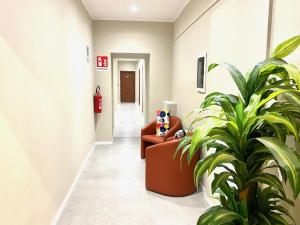 Uma televisão e/ou sistema de entretenimento em Carlo Goldoni Hotel