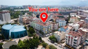 Nespecifikovaný výhled na destinaci Antalya nebo výhled na město při pohledu z apartmánu