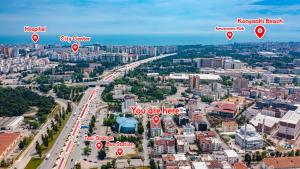 Nespecifikovaný výhled na destinaci Antalya nebo výhled na město při pohledu z apartmánu