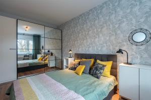 Posteľ alebo postele v izbe v ubytovaní High Standard Luxury Manufaktura