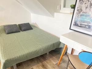 Posteľ alebo postele v izbe v ubytovaní Mosaïque Gare Un-Séjour-à-Part