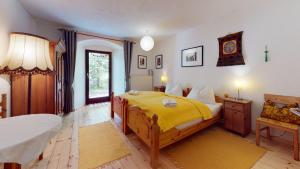 Postel nebo postele na pokoji v ubytování Yoga Resort AlpenRetreat + 37 fotografií