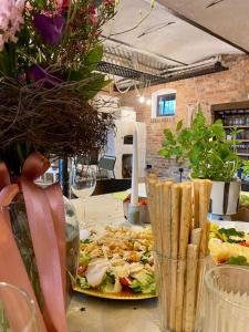 a table with a plate of food on a table at INGLOTÓWKA in Wołów +26 photos