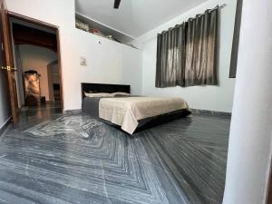 Postel nebo postele na pokoji v ubytování Sai Homestay Margao - 2BHK Apartment