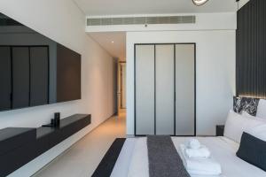 Postel nebo postele na pokoji v ubytování Exclusive! Ultimate Luxury at Address Beach resort
