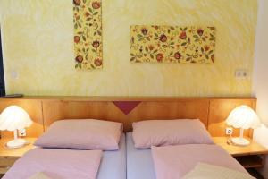 Letto o letti in una camera di Familienparadies Reichenhauser