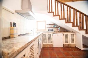 Kuchyň nebo kuchyňský kout v ubytování Casa Buganvilla + 15 fotografií