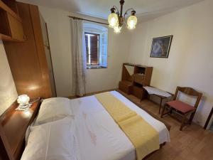 Postel nebo postele na pokoji v ubytování House Lara