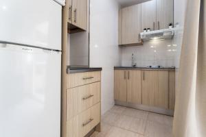 Kuchnia lub aneks kuchenny w obiekcie Sur Suites PYR vista mar
