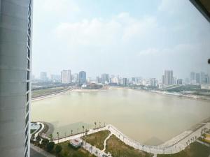 a view of a river from a building at Vinhomes Skylake Pham Hung-Lilyland-near Keangnam in Hanoi