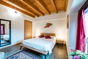 Postel nebo postele na pokoji v ubytování SMART San Martino