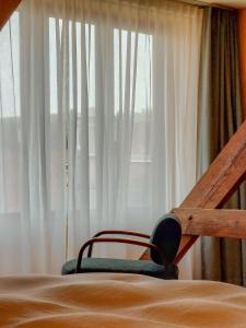 Postel nebo postele na pokoji v ubytování Boutique Hotel Marie Marie