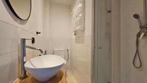 a bathroom with a white sink and a shower at Willa Art in Szklarska Poręba +107 photos