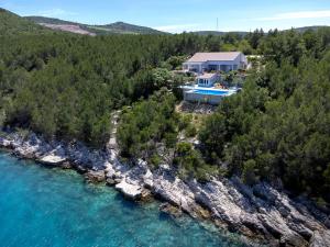 an aerial view of a house next to a river at Villa Serenity in Hvar