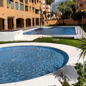 Swimmingpoolen hos eller tæt på Apartamento Torreblanca, Fuengirola