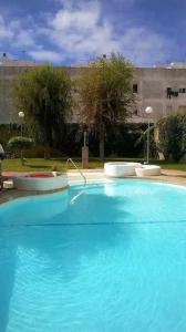 Πισίνα στο ή κοντά στο APARTAMENTO ECHANDO ANCLAS