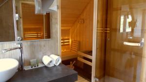 Koupelna v ubytování Les Loges Du Parc