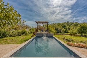 The swimming pool at or close to Rustic Home Izabel - Happy Rentals
