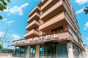 a building with a sign that reads hotel hirsch at EURHOTEL in Florence