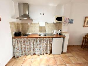 Kuchyňa alebo kuchynka v ubytovaní Apartamentos Villa Torcal