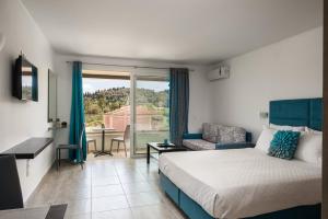 Postel nebo postele na pokoji v ubytování Delight Corfu Apart Hotel, Sidari