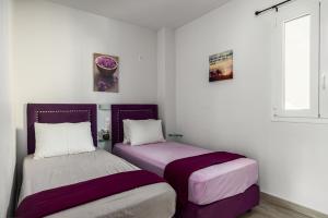 Postel nebo postele na pokoji v ubytování Delight Corfu Apart Hotel, Sidari