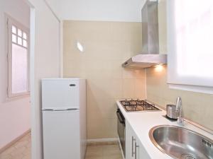 Kuchyňa alebo kuchynka v ubytovaní Suites4days Gaudi Eixample