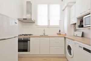 Kuchyňa alebo kuchynka v ubytovaní Suites4days Gaudi Eixample