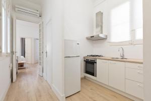 Kuchyňa alebo kuchynka v ubytovaní Suites4days Gaudi Eixample