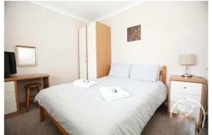 Posteľ alebo postele v izbe v ubytovaní Exclusive 2 bedroom bungalow Oulten Broad