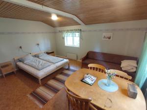 Postel nebo postele na pokoji v ubytování Selholmens Camping