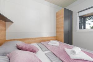 Ein Bett oder Betten in einem Zimmer der Unterkunft Guest House Malenica