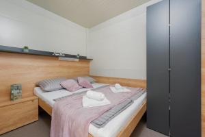 Ein Bett oder Betten in einem Zimmer der Unterkunft Guest House Malenica