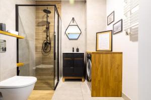 Kúpeľňa v ubytovaní Apartamenty Cisza & Spoko! - ACCO RENT + 37 fotografií