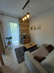 Posedenie v ubytovaní MK Apartament IV
