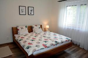 Postel nebo postele na pokoji v ubytování Apartmány u Kotačků