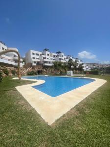 Πισίνα στο ή κοντά στο Apartamento en Nerja con vistas al Mar.