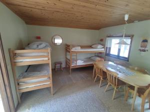 Postel nebo postele na pokoji v ubytování Selholmens Camping