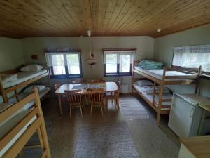 Postel nebo postele na pokoji v ubytování Selholmens Camping