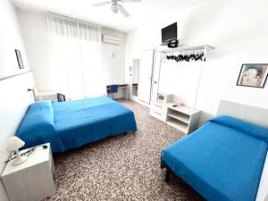 Postel nebo postele na pokoji v ubytování B&B Moresco