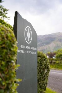 a sign for the leftelines head hotel on a road at The Leathes Head Hotel in Keswick