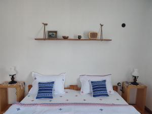 Postel nebo postele na pokoji v ubytování Casa Traditionala Clisciova